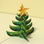Livre de papel modelo da árvore de Natal